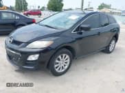 ✅ 2012 Mazda CX-7 i SV • VIN: JM3ER2A57C0415278 • Lot: 42488741. Listed on IAAI with 124,883 mi. Free auction sales archive from the USA and detailed vehicle history report at DreamBid. Image 2.