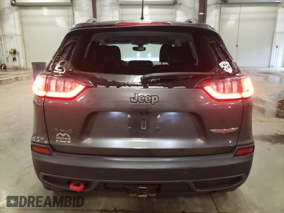 ✅ 2020 Jeep Cherokee Trailhawk • VIN: 1C4PJMBXXLD563650 • Lot: 65372995. Wystawiony na Copart z przebiegiem 32 139 mil. Bezpłatny archiwum sprzedaży aukcyjnych z USA i szczegółowy raport historii pojazdu na DreamBid. Zdjęcie 6.