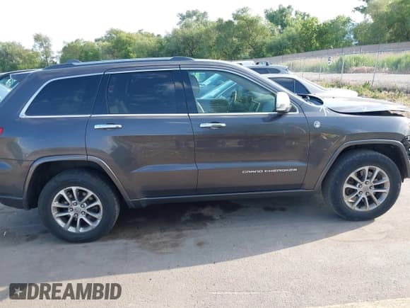 ✅ 2015 Jeep Grand Cherokee Overland • VIN: 1C4RJFCM7FC848289 • Lot: 42416578. Listed on IAAI with Not provided. Free auction sales archive from the USA and detailed vehicle history report at DreamBid. Image 14.