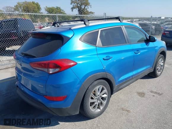 2016 Hyundai Tucson SE with VIN KM8J3CA4XGU126671, listed as a IAAI auction lot 43321548 with 150,034 mi miles and . Bid and sale history available at DreamBid. Image 4.