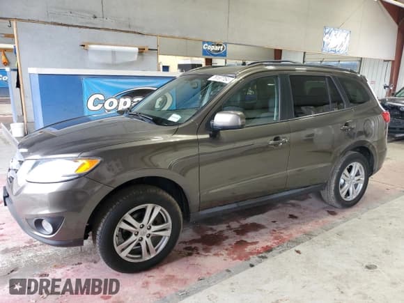 ✅ 2012 Hyundai Santa Fe SE • VIN: 5XYZH4AG6CG135162 • Lot: 79197764. Listed on Copart with 87,661 mi. Free auction sales archive from the USA and detailed vehicle history report at DreamBid. Image 1.
