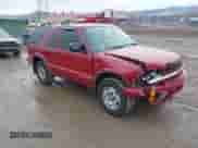 2003 Chevrolet Blazer LS z VIN 1GNCT18X93K171504, wystawiony jako IAAI lot #41682798 z przebiegiem 74 017 mil mil oraz . Historia ofert i sprzedaży dostępna na DreamBid. Obrazek 1.