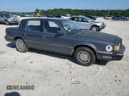 ✅ 1989 Dodge Dynasty • VIN: 1B3BC4632KD615753 • Lot: 64080955. Listed on Copart with 54,020 mi. Free auction sales archive from the USA and detailed vehicle history report at DreamBid. Image 4.