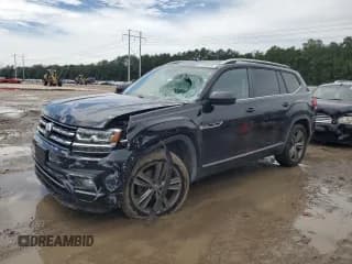 ✅ 2019 Volkswagen Atlas SE • VIN: 1V2YR2CA0KC623076 • Lot: 61184125. Listed on Copart with 64,975 mi. Free auction sales archive from the USA and detailed vehicle history report at DreamBid. Image 1.