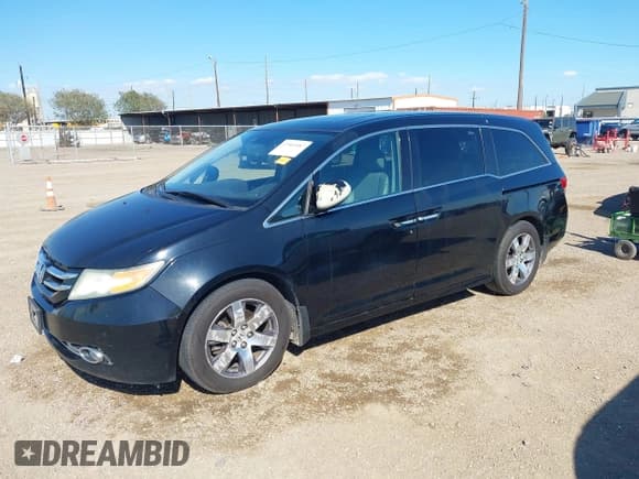 ✅ 2015 Honda Odyssey Touring Elite • VIN: 5FNRL5H96FB062463 • Lot: 43565087. Listed on IAAI with 271,426 mi. Free auction sales archive from the USA and detailed vehicle history report at DreamBid. Image 17.