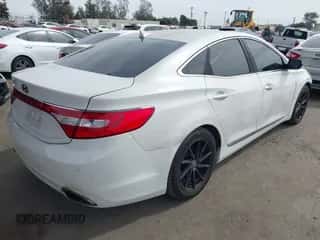 2013 Hyundai Azera с VIN KMHFG4JG3DA250451, выставлен на аукционе IAAI как лот 41682203 с пробегом 132 229 миль миль и . История ставок и продаж доступна на DreamBid. Изображение 4.