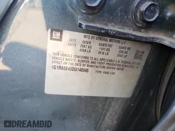 2013 Chevrolet Volt z VIN 1G1RA6E43DU148945, wystawiony jako Copart lot #70898635 z przebiegiem 176 658 mil mil oraz Szkoda całkowita • Salvage title. Historia ofert i sprzedaży dostępna na DreamBid. Obrazek 13.