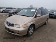 ✅ 2000 Honda Odyssey EX • VIN: 2HKRL1869YH621331 • Lot: 43774348. Listed on IAAI with 144,405 mi. Free auction sales archive from the USA and detailed vehicle history report at DreamBid. Image 2.