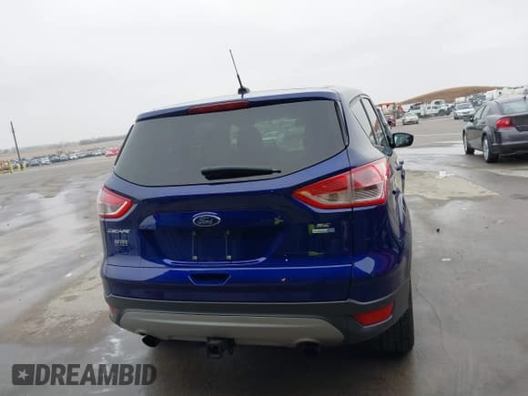 ✅ 2014 Ford Escape SE • VIN: 1FMCU9G93EUB40727 • Lot: 43711563. Listed on IAAI with 83,801 mi. Free auction sales archive from the USA and detailed vehicle history report at DreamBid. Image 16.