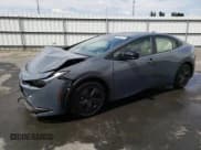 ✅ 2023 Toyota Prius LE • VIN: JTDACAAU1P3004571 • Лот: 57877853. Опубликован ранее на Copart с пробегом 8 760 миль. Бесплатный доступ к архиву аукционных продаж из США и подробный отчёт об истории автомобиля на DreamBid. Изображение 1.