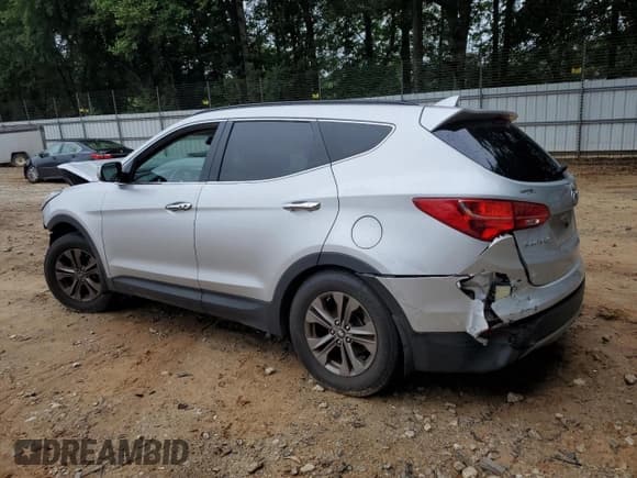 ✅ 2014 Hyundai Santa Fe • VIN: 5XYZU3LB7EG206492 • Лот: 69850035. Опубликован ранее на Copart с пробегом Не указан. Бесплатный доступ к архиву аукционных продаж из США и подробный отчёт об истории автомобиля на DreamBid. Изображение 2.