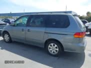 ✅ 2002 Honda Odyssey EX-L • VIN: 2HKRL18702H537396 • Lot: 42097471. Listed on IAAI with 291,432 mi. Free auction sales archive from the USA and detailed vehicle history report at DreamBid. Image 3.