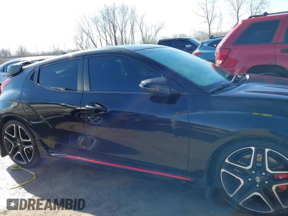 2019 Hyundai Veloster N z VIN KMHT36AH9KU002414, wystawiony jako IAAI lot #41990822 z przebiegiem 85 505 mil mil oraz . Historia ofert i sprzedaży dostępna na DreamBid. Obrazek 13.