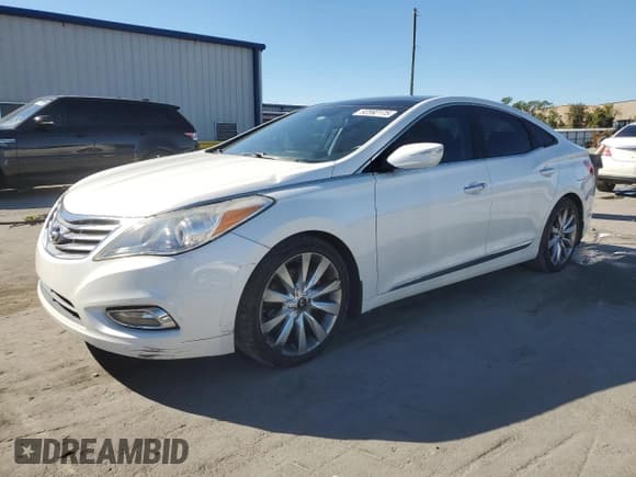 ✅ 2013 Hyundai Azera • VIN: KMHFH4JG6DA268746 • Lot: 92592175. Listed on Copart with 155,018 mi. Free auction sales archive from the USA and detailed vehicle history report at DreamBid. Image 1.