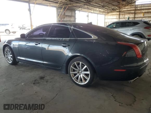 ✅ 2013 Jaguar XJ • VIN: SAJWA1C73D8V40604 • Лот: 71858365. Опубликован ранее на Copart с пробегом 103 006 миль. Бесплатный доступ к архиву аукционных продаж из США и подробный отчёт об истории автомобиля на DreamBid. Изображение 2.