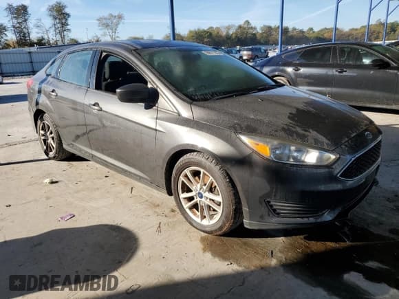 ✅ 2018 Ford Focus SE • VIN: 1FADP3FE4JL276933 • Lot: 90671225. Listed on Copart with 89,503 mi. Free auction sales archive from the USA and detailed vehicle history report at DreamBid. Image 4.