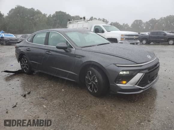 2025 Hyundai Sonata SEL with VIN KMHL64JA6SA502773, listed as a Copart auction lot 90327405 with 6,770 mi miles and Salvage title. Bid and sale history available at DreamBid. Image 4.