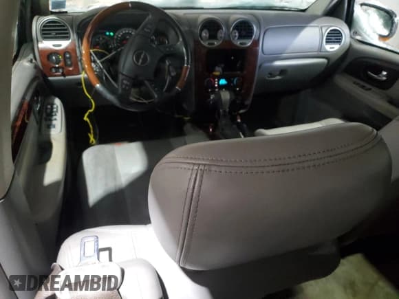 ✅ 2005 GMC Envoy SLT • VIN: 1GKET16MX56178861 • Lot: 45738005. Listed on Copart with 134,551 mi. Free auction sales archive from the USA and detailed vehicle history report at DreamBid. Image 8.