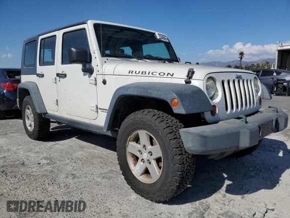 ✅ 2008 Jeep Wrangler Unlimited Rubicon • VIN: 1J8GA69118L642952 • Lot: 84234865. Listed on Copart with 182,418 mi. Free auction sales archive from the USA and detailed vehicle history report at DreamBid. Image 4.