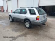 ✅ 2001 Honda Passport LX • VIN: 4S6CK58W714414399 • Lot: 41641270. Listed on IAAI with 203,093 mi. Free auction sales archive from the USA and detailed vehicle history report at DreamBid. Image 3.