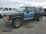 ✅ 1991 Ford Ranger • VIN: 1FTCR15T2MTA40662 • Lot: 71111795. Listed on Copart with 90,409 mi. Free auction sales archive from the USA and detailed vehicle history report at DreamBid. Image 1.