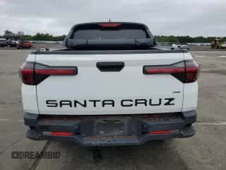 2022 Hyundai Santa Cruz SEL z VIN 5NTJBDAE9NH009503, wystawiony jako Copart lot #64002324 z przebiegiem 60 043 mil mil oraz Szkoda całkowita • Salvage title. Historia ofert i sprzedaży dostępna na DreamBid. Obrazek 6.