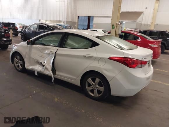 ✅ 2013 Hyundai Elantra GLS • VIN: 5NPDH4AE3DH316075 • Lot: 43419095. Listed on IAAI with 175,956 mi. Free auction sales archive from the USA and detailed vehicle history report at DreamBid. Image 3.