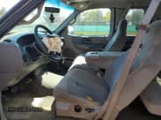 ✅ 2000 Ford F-150 XL • VIN: 1FTRX18L9YKA39810 • Lot: 85877565. Listed on Copart with 191,424 mi. Free auction sales archive from the USA and detailed vehicle history report at DreamBid. Image 7.