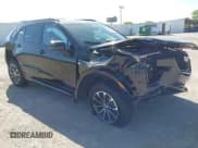 ✅ 2024 Cadillac XT4 AWD Sport • VIN: 1GYFZFR40RF222938 • Lot: 42830030. Listed on IAAI with 5,162 mi. Free auction sales archive from the USA and detailed vehicle history report at DreamBid. Image 1.