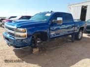 ✅ 2018 Chevrolet Silverado 2500HD High Country • VIN: 1GC1KXEY8JF277290 • Lot: 43465114. Listed on IAAI with 159,038 mi. Free auction sales archive from the USA and detailed vehicle history report at DreamBid. Image 2.