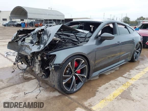 ✅ 2023 Audi RS 7 • VIN: WUAPCBF20PN905140 • Лот: 41477057. Опубликован ранее на IAAI с пробегом 11 794 миль. Бесплатный доступ к архиву аукционных продаж из США и подробный отчёт об истории автомобиля на DreamBid. Изображение 2.