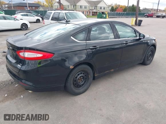 ✅ 2013 Ford Fusion SE • VIN: 3FA6P0HR3DR241149 • Lot: 43635203. Listed on IAAI with 205,008 mi. Free auction sales archive from the USA and detailed vehicle history report at DreamBid. Image 4.