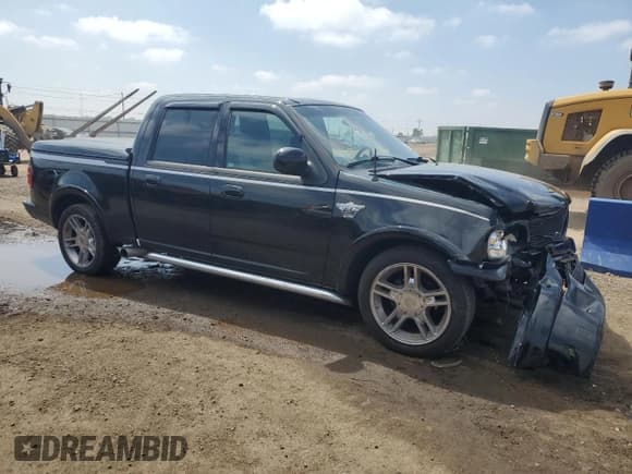 ✅ 2003 Ford F-150 Harley-Davidson • VIN: 1FTRW07373KD66326 • Lot: 59382485. Listed on Copart with 84,079 mi. Free auction sales archive from the USA and detailed vehicle history report at DreamBid. Image 4.