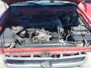 ✅ 1999 Toyota Tacoma • VIN: 4TAVL52N1XZ460806 • Lot: 42829465. Wystawiony na IAAI z przebiegiem 484 768 mil. Bezpłatny archiwum sprzedaży aukcyjnych z USA i szczegółowy raport historii pojazdu na DreamBid. Zdjęcie 10.