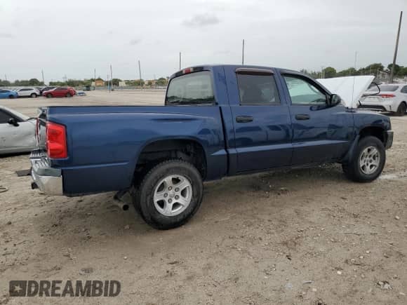 2005 Dodge Dakota SLT с VIN 1D7HE48N55S187166, выставлен на аукционе Copart как лот 59191165 с пробегом Не указан миль и Списание • Salvage title. История ставок и продаж доступна на DreamBid. Изображение 3.