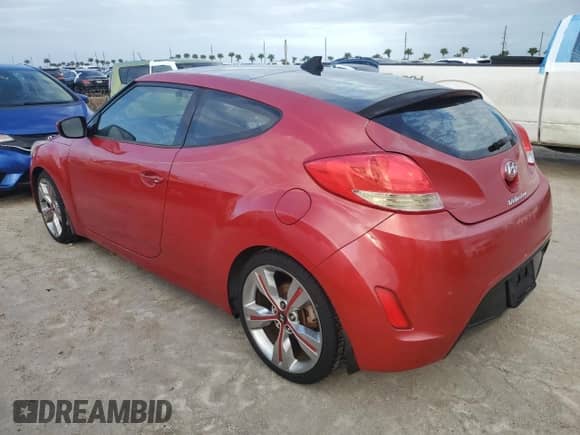2013 Hyundai Veloster w/Gray Int с VIN KMHTC6ADXDU098117, выставлен на аукционе Copart как лот 74143514 с пробегом Не указан миль и Списание • Salvage title. История ставок и продаж доступна на DreamBid. Изображение 2.
