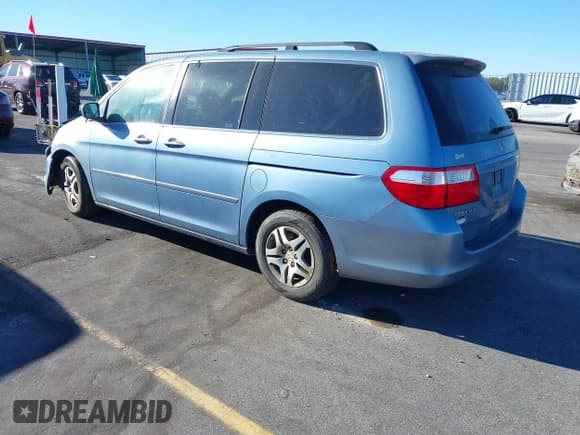 ✅ 2007 Honda Odyssey EX • VIN: 5FNRL38467B036519 • Lot: 43702862. Listed on IAAI with 218,014 mi. Free auction sales archive from the USA and detailed vehicle history report at DreamBid. Image 3.