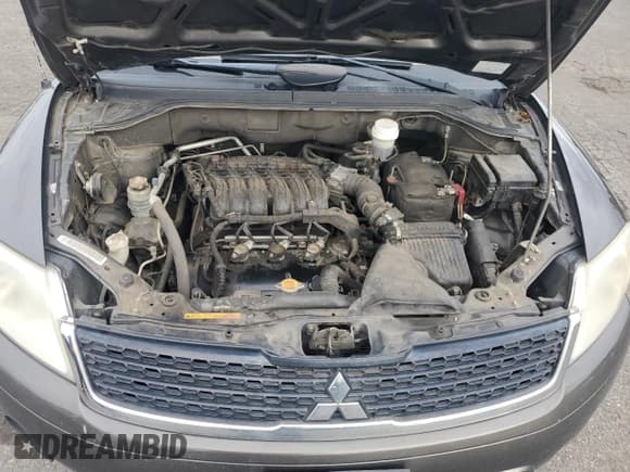 ✅ 2011 Mitsubishi Endeavor LS • VIN: 4A4JM2AS1BE023886 • Lot: 86185465. Listed on Copart with 217,231 mi. Free auction sales archive from the USA and detailed vehicle history report at DreamBid. Image 11.