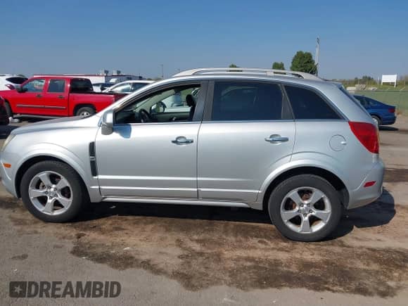 2013 Chevrolet Captiva Sport LTZ z VIN 3GNAL4EK1DS617118, wystawiony jako IAAI lot #43467944 z przebiegiem 73 297 mil mil oraz . Historia ofert i sprzedaży dostępna na DreamBid. Obrazek 14.