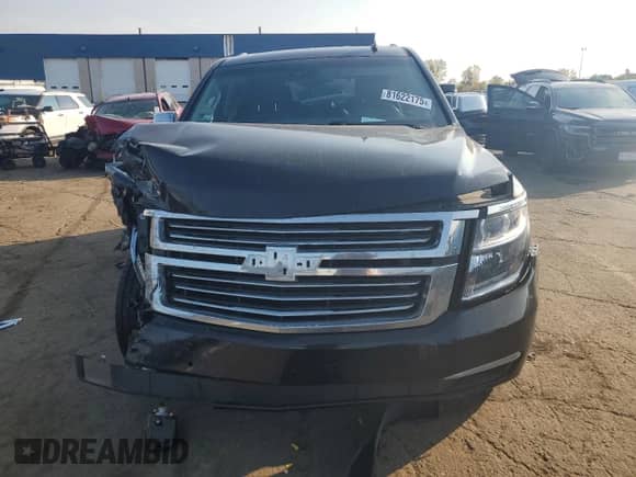 2015 Chevrolet Tahoe LTZ with VIN 1GNSKCKC7FR176146, listed as a Copart auction lot 81622175 with 226,795 mi miles and Salvage title. Bid and sale history available at DreamBid. Image 5.