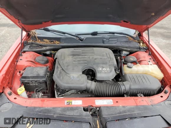 ✅ 2014 Dodge Challenger SXT • VIN: 2C3CDYAG5EH311314 • Lot: 80556194. Listed on Copart with 128,541 mi. Free auction sales archive from the USA and detailed vehicle history report at DreamBid. Image 12.