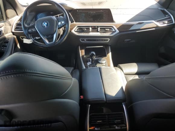 ✅ 2023 BMW X5 xDrive45e • VIN: 5UXTA6C03P9N92460 • Лот: 87025515. Опубликован ранее на Copart с пробегом 65 068 миль. Бесплатный доступ к архиву аукционных продаж из США и подробный отчёт об истории автомобиля на DreamBid. Изображение 8.