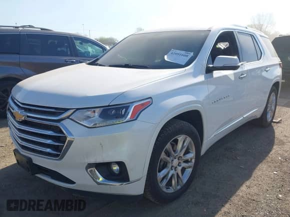 2020 Chevrolet Traverse High Country z VIN 1GNEVNKWXLJ178011, wystawiony jako IAAI lot #42091608 z przebiegiem 62 035 mil mil oraz . Historia ofert i sprzedaży dostępna na DreamBid. Obrazek 2.