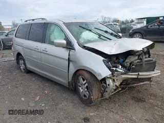 ✅ 2005 Honda Odyssey EX • VIN: 5FNRL38495B034227 • Lot: 43710233. Listed on IAAI with 185,579 mi. Free auction sales archive from the USA and detailed vehicle history report at DreamBid. Image 1.