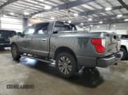 ✅ 2017 Nissan Titan Pro-4X • VIN: 1N6AA1E50HN510890 • Lot: 85209325. Listed on Copart with 93,978 mi. Free auction sales archive from the USA and detailed vehicle history report at DreamBid. Image 2.