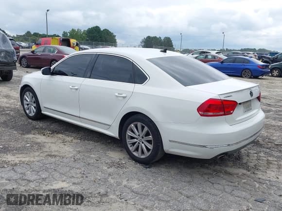 ✅ 2013 Volkswagen Passat SEL • VIN: 1VWCP7A37DC070316 • Lot: 42920334. Listed on IAAI with 211,425 mi. Free auction sales archive from the USA and detailed vehicle history report at DreamBid. Image 3.