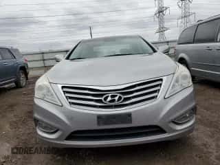 ✅ 2012 Hyundai Azera • VIN: KMHFH4JG1CA186454 • Lot: 51685695. Wystawiony na Copart z przebiegiem 123 327 mil mil. Skorzystaj z bezpłatnego archiwum sprzedaży aukcyjnych z USA i zobacz szczegółowy raport historii pojazdu na DreamBid. Zdjęcie 5.