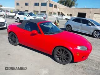 ✅ 2006 Mazda MX-5 Miata MX-5 • VIN: JM1NC25F560119547 • Lot: 43480565. Listed on IAAI with 106,854 mi. Free auction sales archive from the USA and detailed vehicle history report at DreamBid. Image 1.