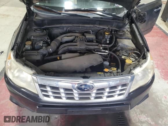 ✅ 2012 Subaru Forester X Premium • VIN: JF2SHADC9CH421508 • Lot: 92393555. Listed on Copart with 117,995 mi. Free auction sales archive from the USA and detailed vehicle history report at DreamBid. Image 12.