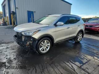 2014 Hyundai Santa Fe с VIN 5XYZUDLA4EG226776, выставлен на аукционе Copart как лот 86997625 с пробегом 135 442 миль миль и Списание • Salvage title. История ставок и продаж доступна на DreamBid. Изображение 1.